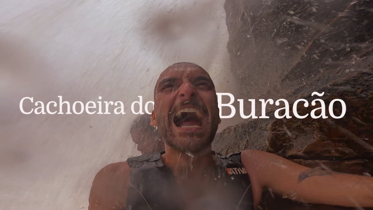 Nando under the falls of Cachoeira do Buracão, in Chapada Diamantina, cover of the post