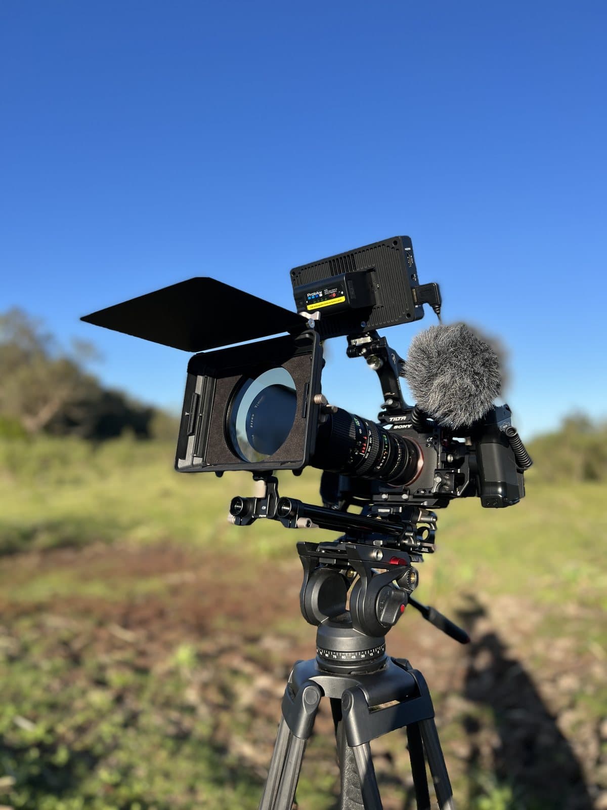 The camera on a tripod in the field