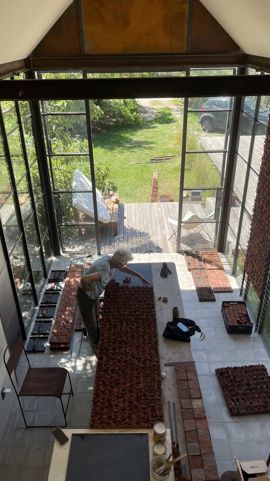 The studio, with brick pieces on the table