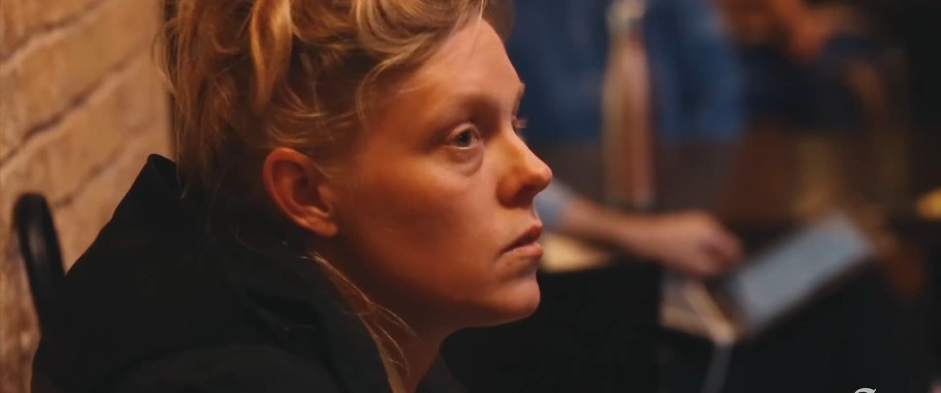 Portrait of a woman in a bar