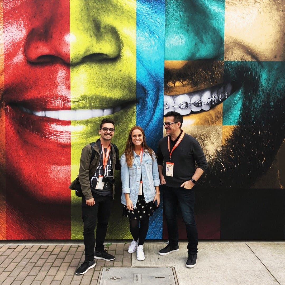 In front of the Kobra mural, in Austin