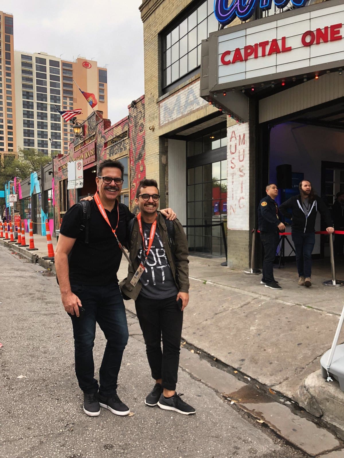 In front of the Capital One marquee, in Austin