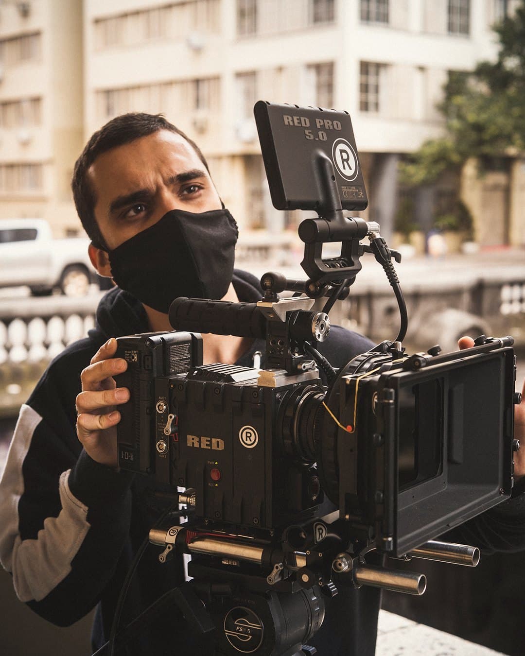 Nando in a mask with the RED camera, on the street
